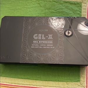 Gel X nail tips in Natural Coffin Medium